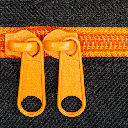 orange closure zip on a black background