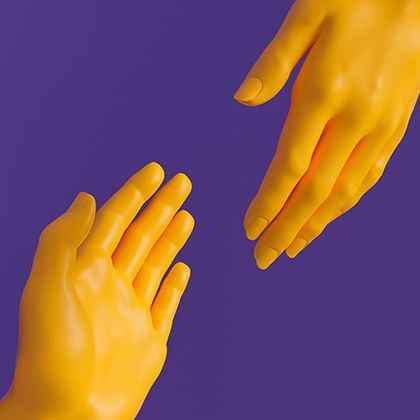 Two hands joining in a handshake